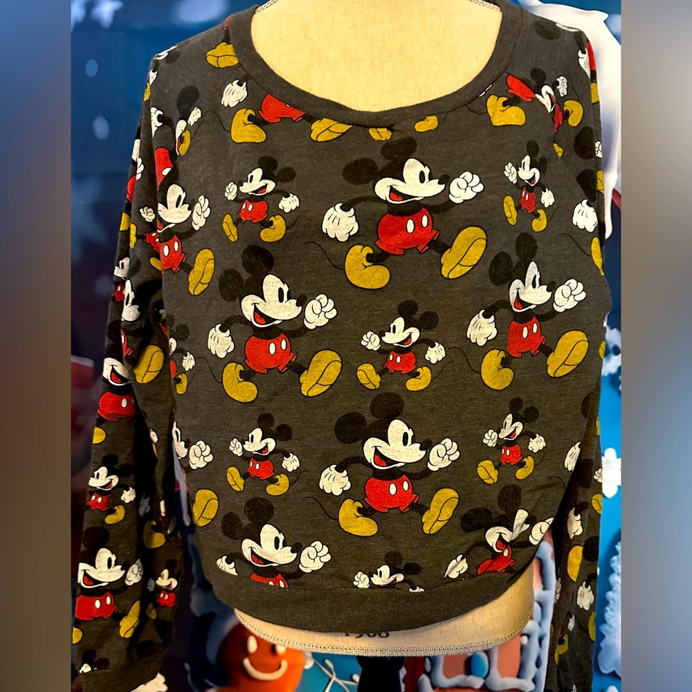 Disney sweatshirt in XL black background with many Mickey Mouse’s